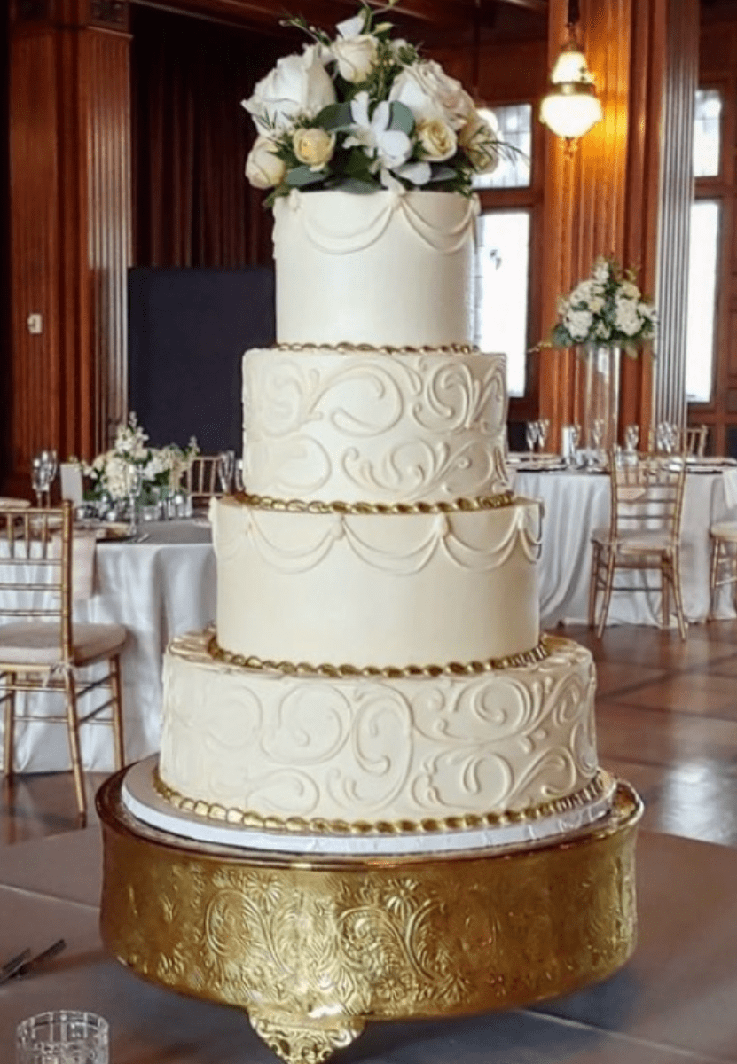 Wedding cake decorated with red roses